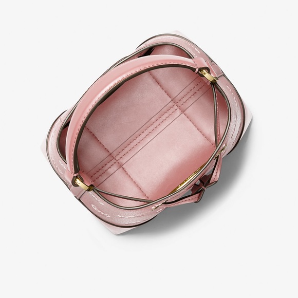 MICHAEL KORS
Mercer Small Logo Embossed Leather Bucket Bag
COLOR PRIMROSE 
NWT - Picture 3 of 4